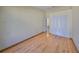 Cozy bedroom offers wood laminate floors and a large closet at 1604 Storington Ave, Brandon, FL 33511