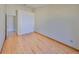 Bedroom featuring a large closet and wood laminate floors at 1604 Storington Ave, Brandon, FL 33511