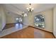 Dining area showcases large windows and laminate flooring, filling the space with light at 1604 Storington Ave, Brandon, FL 33511