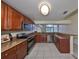 Well-equipped kitchen features granite countertops and stainless steel appliances at 1604 Storington Ave, Brandon, FL 33511