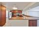 A well-lit kitchen featuring stainless steel appliances and countertops at 1604 Storington Ave, Brandon, FL 33511