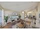 Open-concept living room featuring hardwood floors and a combined dining area at 1604 Storington Ave, Brandon, FL 33511