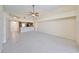 Open-concept living room, connecting to the kitchen and dining area at 1604 Storington Ave, Brandon, FL 33511