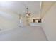 Open floor plan features a large living room and a kitchen bar at 1604 Storington Ave, Brandon, FL 33511