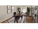 Modern home office with a black desk and artistic decor at 1604 Storington Ave, Brandon, FL 33511