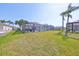 This home features a screened-in pool, a spacious yard, and beautiful landscaping at 1604 Storington Ave, Brandon, FL 33511