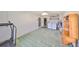 Spacious basement with a ceiling fan, laundry area with washer and dryer and utility sink at 1809 Haverford Ave, Sun City Center, FL 33573