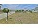 Charming single-story home with a well-maintained front yard and attached garage at 1809 Haverford Ave, Sun City Center, FL 33573