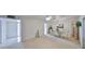 Bright living room with carpet and an open floor plan at 1809 Haverford Ave, Sun City Center, FL 33573