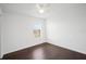 Bedroom with hardwood floors, ceiling fan, a window, and natural light at 2122 Richwood Pike Dr, Ruskin, FL 33570