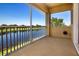 This screened balcony overlooks a lake and green space at 2246 Sifield Greens Way # 36, Sun City Center, FL 33573