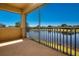 Screened-in balcony with view of the lake at 2246 Sifield Greens Way # 36, Sun City Center, FL 33573