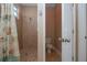 Bathroom with walk-in shower and toilet at 2246 Sifield Greens Way # 36, Sun City Center, FL 33573