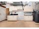 Garage featuring built-in cabinets, a sink, and ample storage space for a clean and organized look at 2246 Sifield Greens Way # 36, Sun City Center, FL 33573