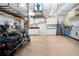 Bright and spacious garage with built-in cabinets, a sink, and plenty of storage space at 2246 Sifield Greens Way # 36, Sun City Center, FL 33573
