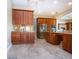 Spacious kitchen features stainless steel appliances and ample cabinet and counter space at 2246 Sifield Greens Way # 36, Sun City Center, FL 33573