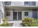 Exterior entrance to units with plants and walkway at 2650 Countryside Blvd # A104, Clearwater, FL 33761