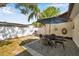 Backyard with privacy fence, patio area, and outdoor grill at 2873 Karen Ave, Largo, FL 33774