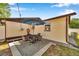 Relaxing backyard patio with outdoor dining set and privacy at 2873 Karen Ave, Largo, FL 33774