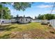 Spacious fenced backyard with patio seating, great for outdoor gatherings and leisure at 2873 Karen Ave, Largo, FL 33774