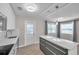 Spacious kitchen featuring a large center island, stainless steel appliances, and an abundance of natural light at 2873 Karen Ave, Largo, FL 33774