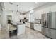 Bright kitchen featuring stainless steel appliances and ample cabinet space at 2919 Northfield Dr, Tarpon Springs, FL 34688