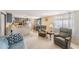 Cozy living room with a view to the kitchen and dining area at 37229 Cora Ave, Zephyrhills, FL 33542