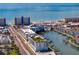 A stunning coastal view with a luxury building near the beach and a tranquil waterfront with boat docks and marinas at 400 150Th Ave # 506, Madeira Beach, FL 33708