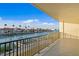 View from the balcony of a waterfront neighborhood with boats docked along the river at 400 150Th Ave # 506, Madeira Beach, FL 33708