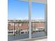 Close up of balcony, showcasing the neighborhood views at 400 150Th Ave # 506, Madeira Beach, FL 33708