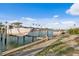 Waterfront property featuring a private boat dock with lift and canal views at 400 150Th Ave # 506, Madeira Beach, FL 33708