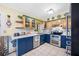 Spacious kitchen featuring ample cabinet space, modern appliances, and a bright, airy atmosphere at 4124 Pine Dale Ct, Hernando Beach, FL 34607
