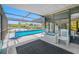 Screened patio with a partially covered pool overlooking the water in a private and relaxing setting at 4124 Pine Dale Ct, Hernando Beach, FL 34607