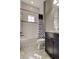 Bathroom with tub and shower combination and neutral-toned walls and floors at 4975 Night Star Trl, Odessa, FL 33556