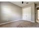 Bedroom featuring neutral colors, carpet, standard closet, and ensuite bathroom at 4975 Night Star Trl, Odessa, FL 33556