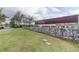 Stone-lined Starkey Ranch entrance with sign and landscaped grounds at 4975 Night Star Trl, Odessa, FL 33556