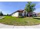Beautiful home with a well-manicured lawn and a charming, landscaped yard at 4975 Night Star Trl, Odessa, FL 33556