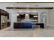 Bright, open kitchen with a large island, stainless steel appliances, and exposed wood beams at 4975 Night Star Trl, Odessa, FL 33556