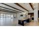 Open-concept kitchen with modern dark cabinetry, a large island, and recessed lighting at 4975 Night Star Trl, Odessa, FL 33556