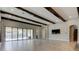 Bright living room with pool view through sliding glass door at 4975 Night Star Trl, Odessa, FL 33556