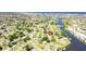 This aerial view showcases a charming waterfront community and highlights the property's location near the water at 512 Flamingo Dr, Apollo Beach, FL 33572