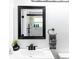 Updated bathroom featuring modern fixtures, a black-framed mirror, and a glass-enclosed shower at 512 Flamingo Dr, Apollo Beach, FL 33572