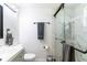 Updated bathroom features a sleek vanity, toilet, and a modern glass-enclosed shower at 512 Flamingo Dr, Apollo Beach, FL 33572