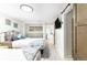 Inviting bedroom with two twin beds, updated decor, and a convenient closet nearby at 512 Flamingo Dr, Apollo Beach, FL 33572