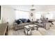 Bright living room with plush sofas, stylish decor, and an open layout perfect for entertaining at 512 Flamingo Dr, Apollo Beach, FL 33572