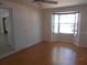 Inviting living room with a large bay window and hardwood floors, creating a cozy atmosphere at 5318 7Th N Ave, St Petersburg, FL 33710