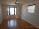 Inviting living room with a large bay window and hardwood floors, creating a cozy atmosphere at 5318 7Th N Ave, St Petersburg, FL 33710