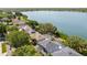 Lakeside homes boast beautiful scenery and community with mature trees and landscaping at 6607 Gates Pointe Way, Riverview, FL 33578