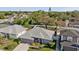 Aerial view of a single-Gathering home featuring lush landscaping and mature trees at 708 Sandy Hills Ave, Tarpon Springs, FL 34689