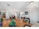 This spacious dining area offers wood floors, crown molding and flows into the bedroom at 708 Sandy Hills Ave, Tarpon Springs, FL 34689